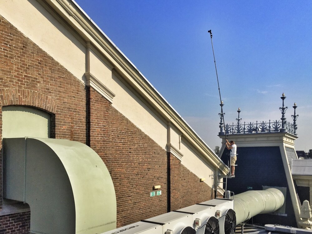 A photo of me with the Photomast in 2016 on a warm September day, preparing for the image of “De Lier” on the Concertgebouw mentioned above