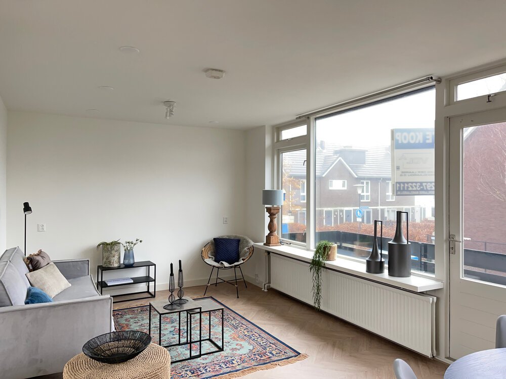 Living area facing windows (iPhone 12 Pro Max)