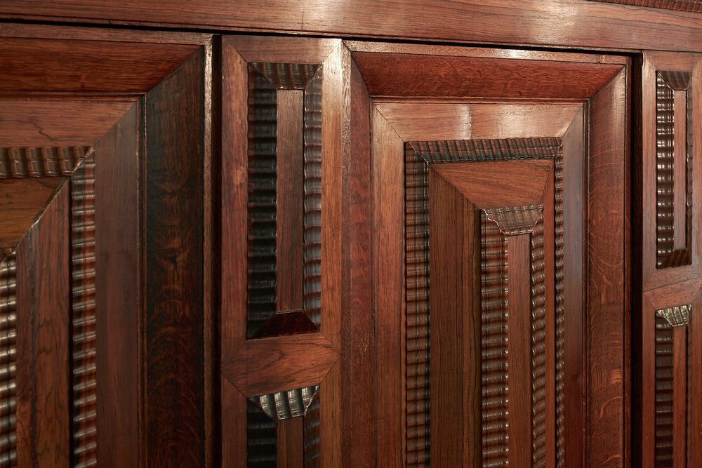 Detail photo of an antique Dutch Renaissance cabinet.