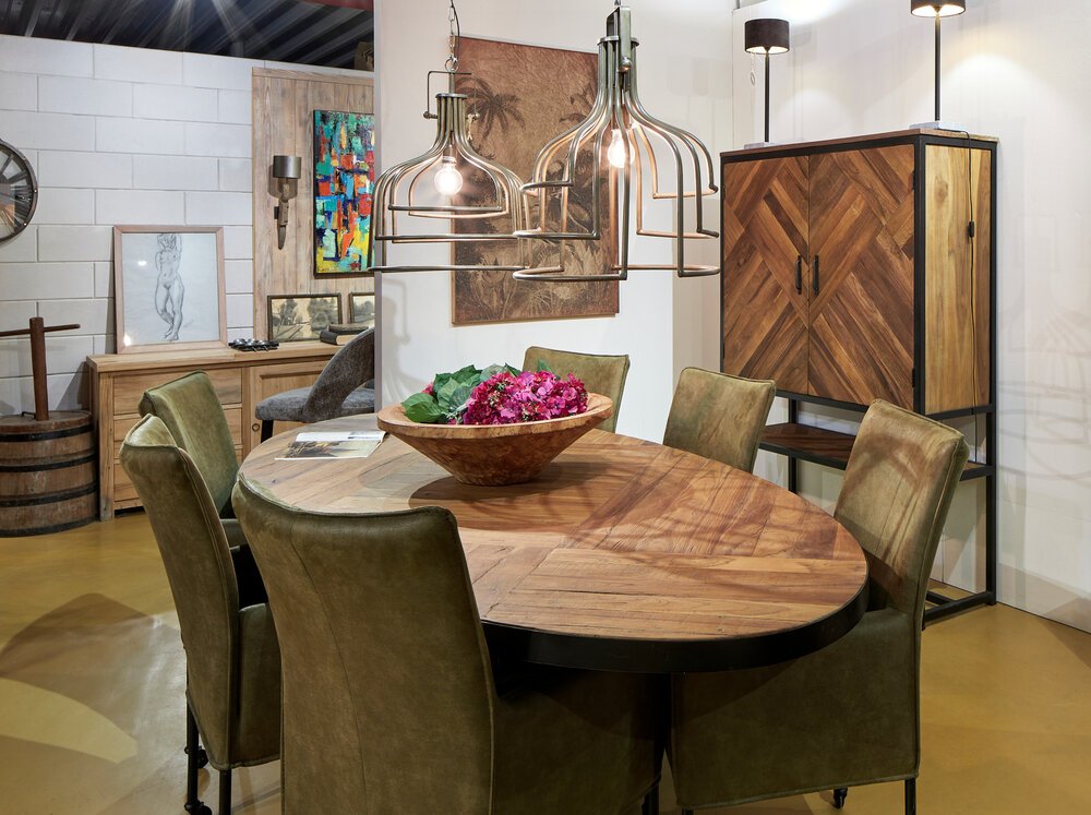 Photo of a dining table with chairs and a cabinet.