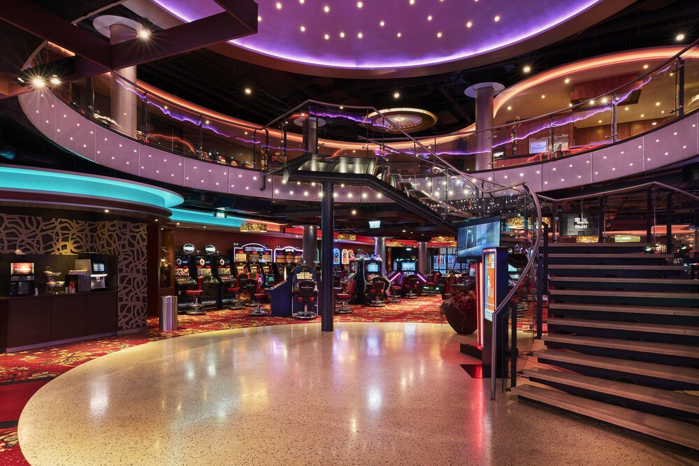Interior photo of the staircase and illuminated dome.