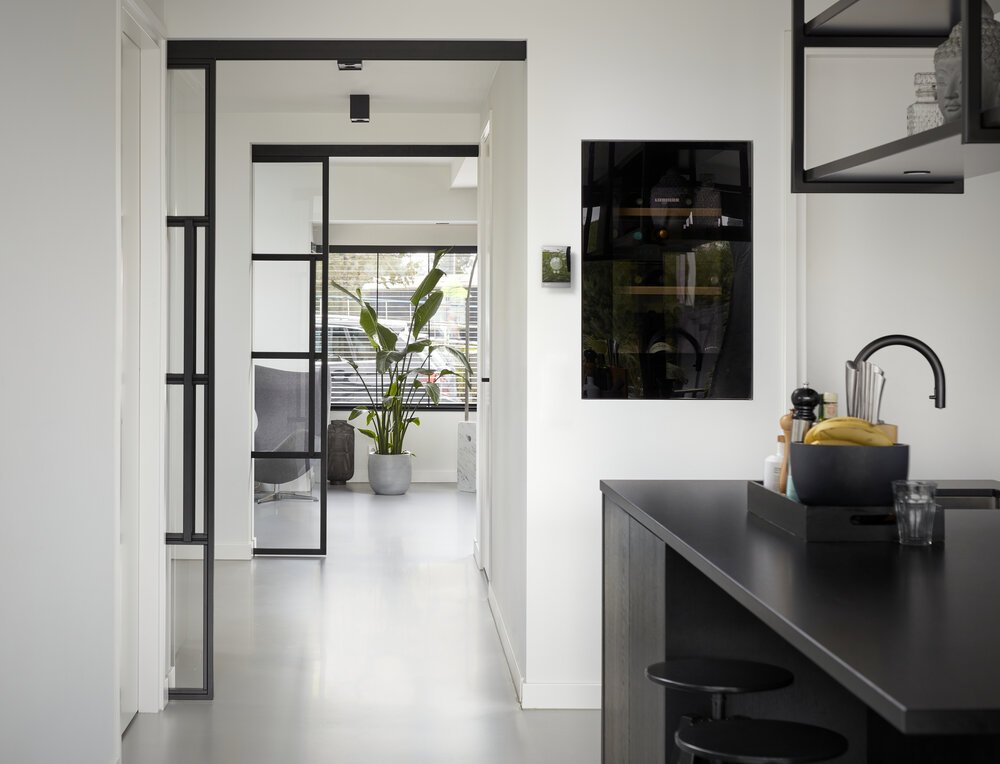 Interior view toward the (renovated yet) original part of the home.