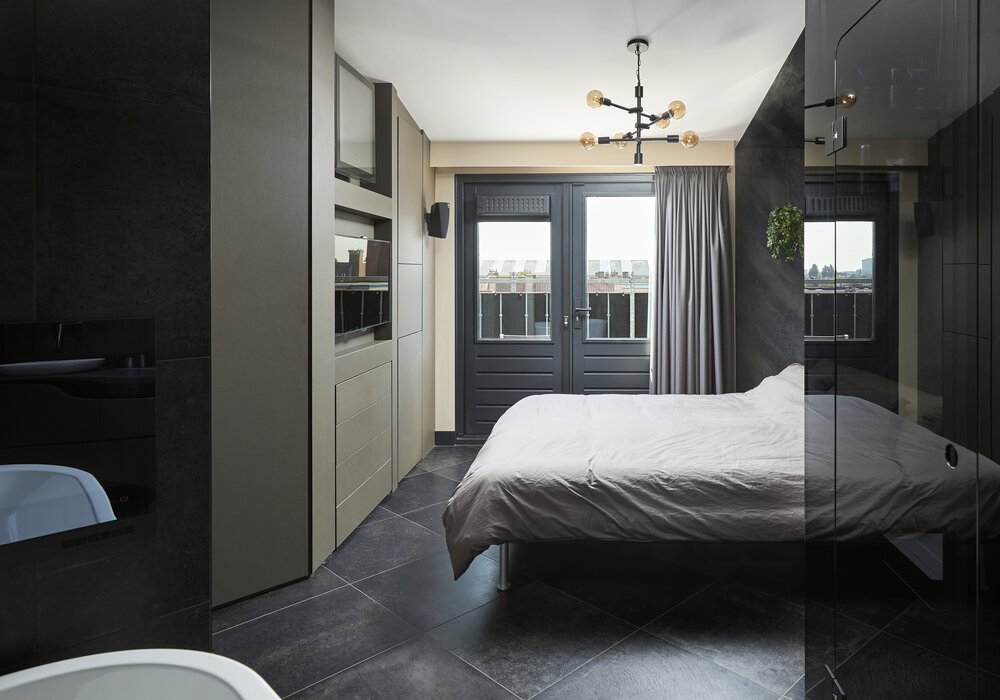 Bedroom facing the same geometric challenges as the other floors.