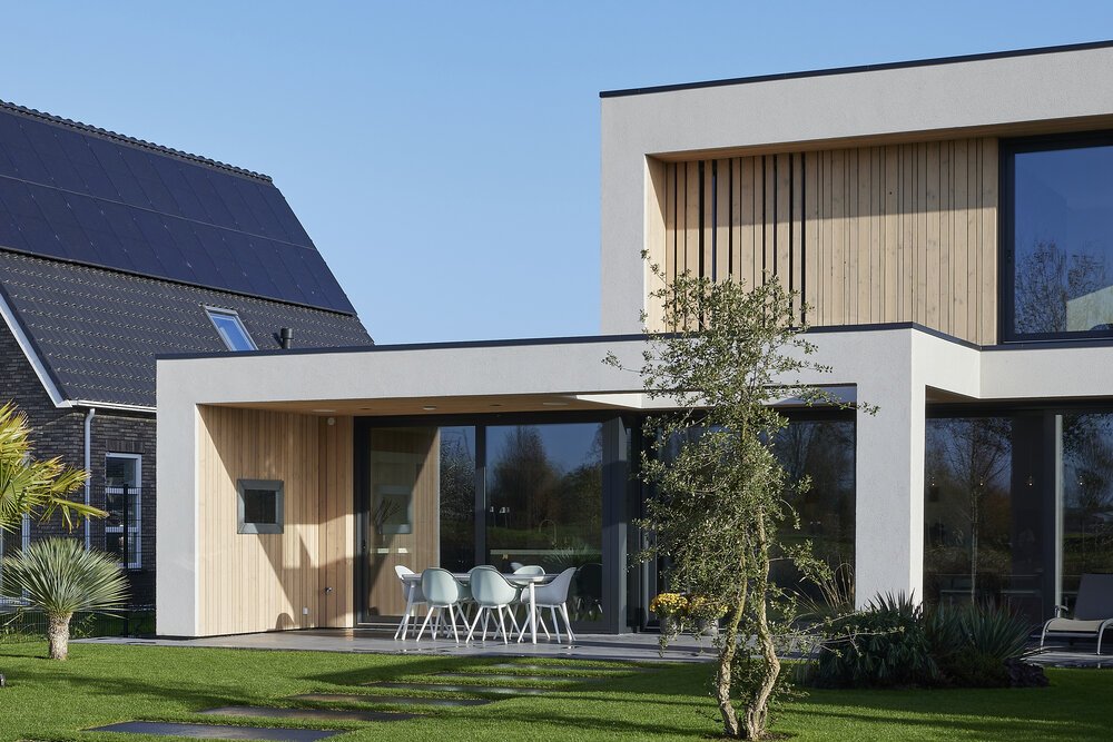 Covered terrace with continuous use of wooden wall and ceiling cladding.