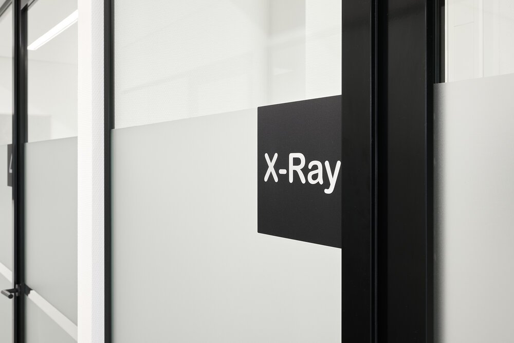 Detail shot of signage for the different rooms.