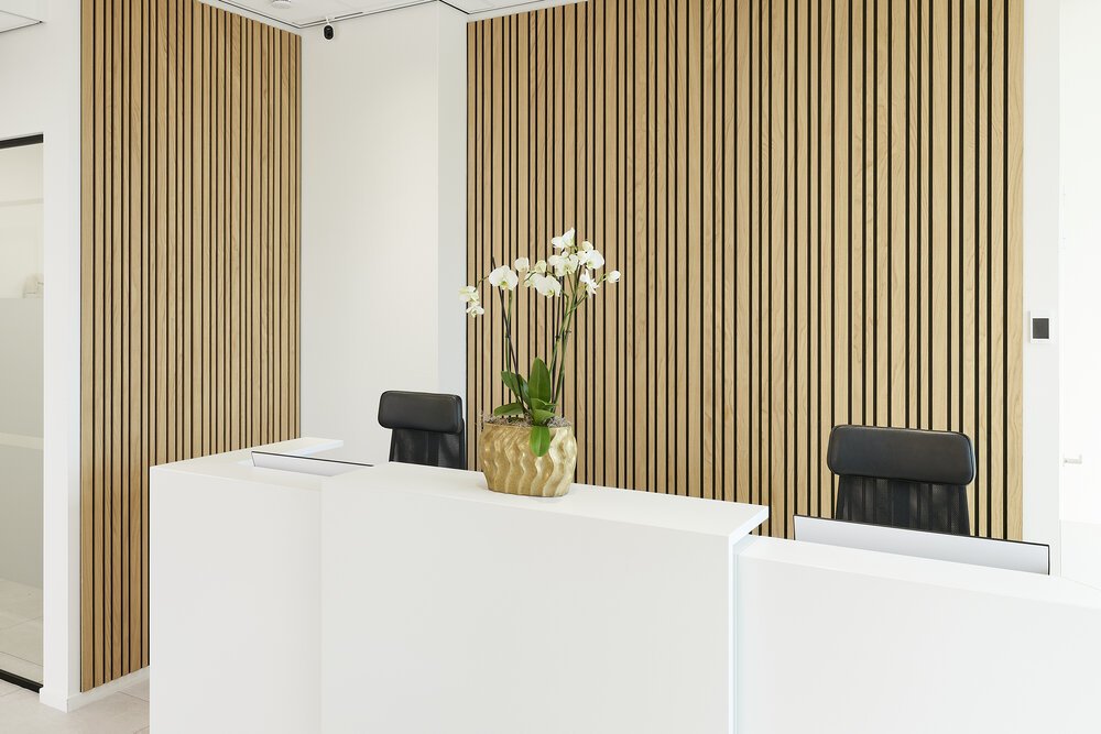 Interior photo of the reception desk.