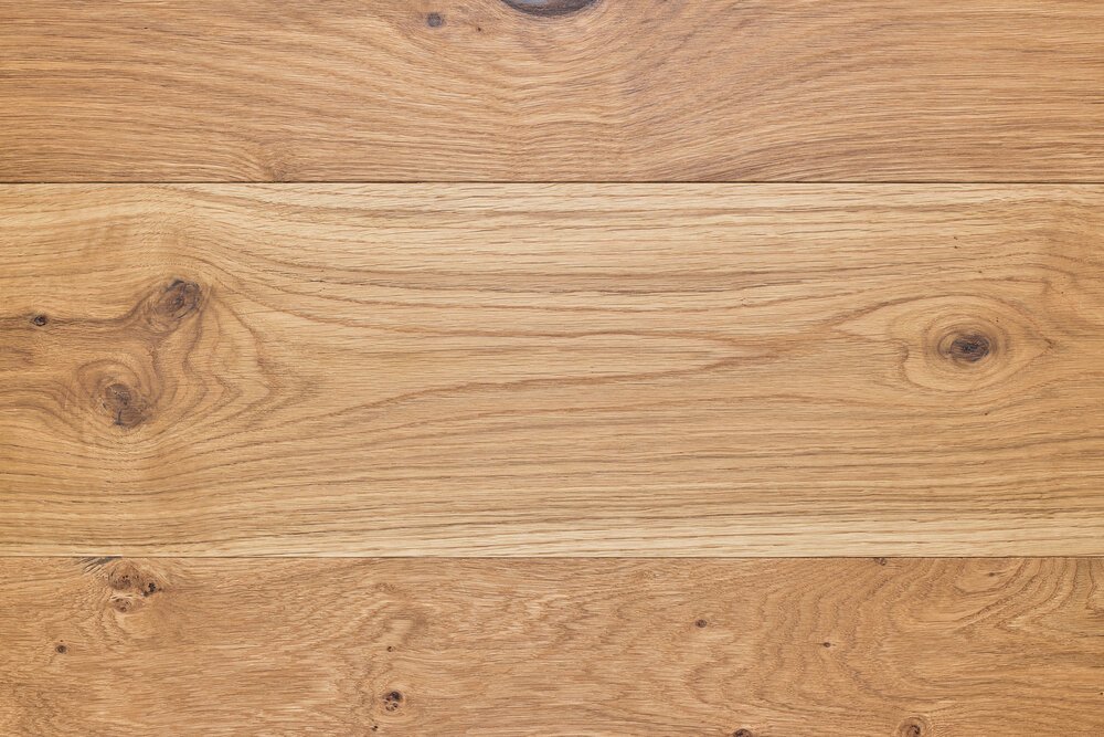 This floor is natural oiled with a smooth finish and a small bevel at the edges.