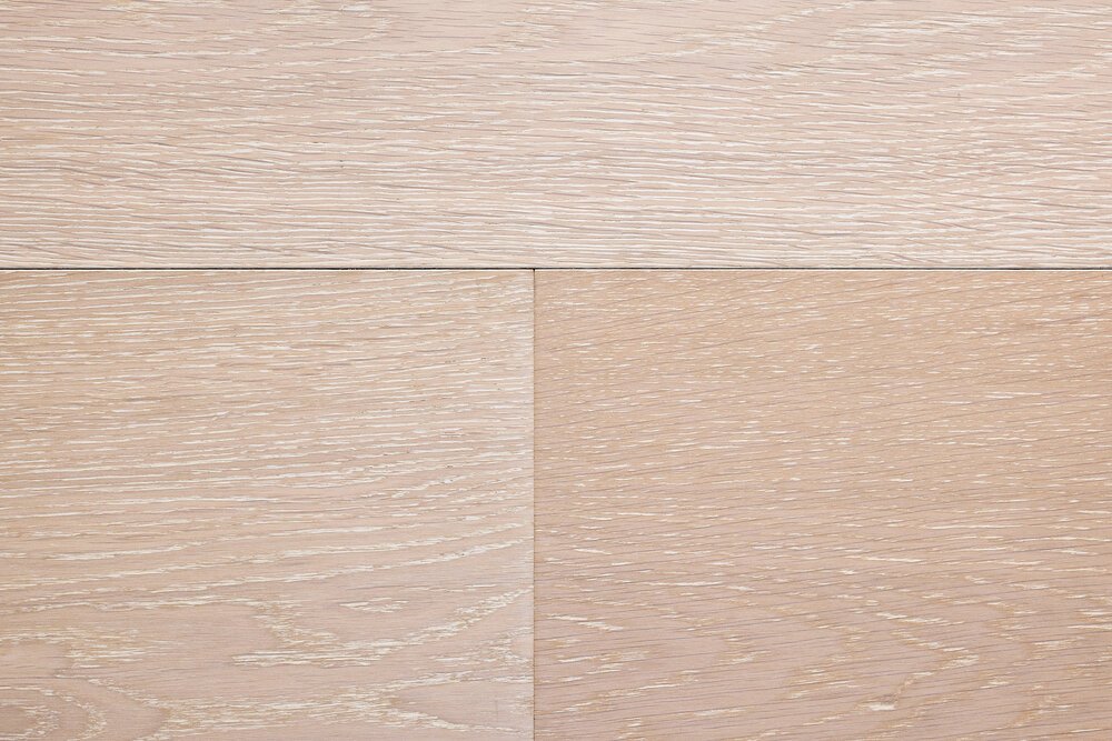 This floor is white-oiled. The finish is brushed with a small bevel at the edges.