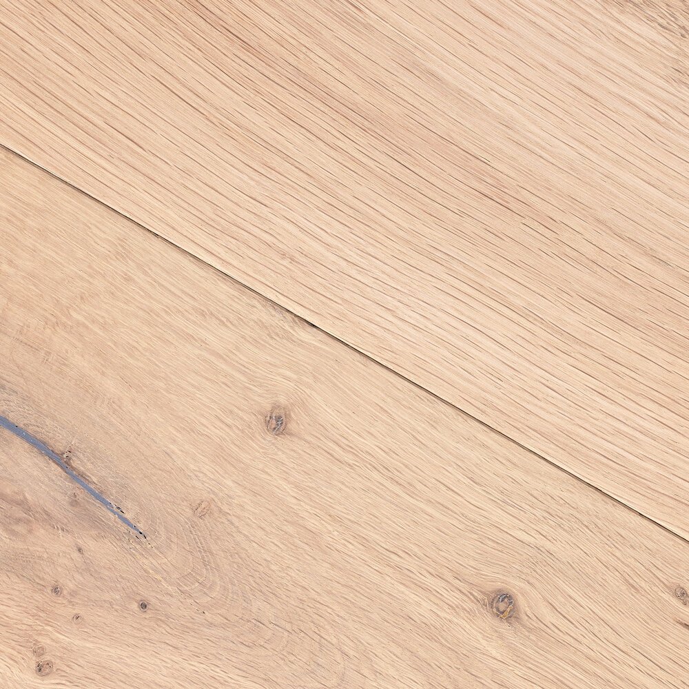 This floor is untreated. The finish is smooth with a small bevel at the edges.