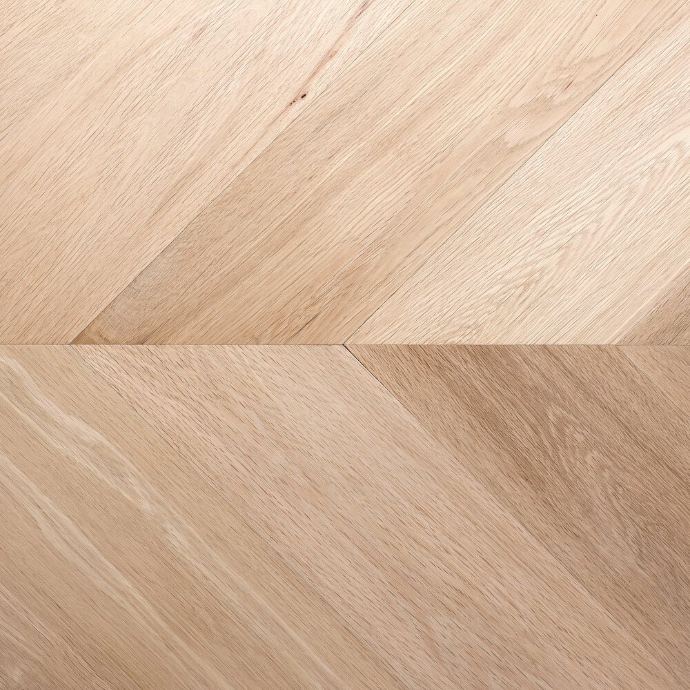 This oak Hungarian point floor is laid at a 45-degree angle. The finish is smooth and installed in a Hungarian point pattern.