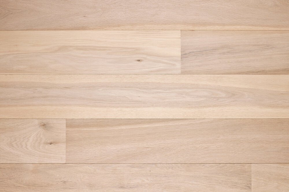 This dimensionally stable engineered floor is untreated and contains very few knots.