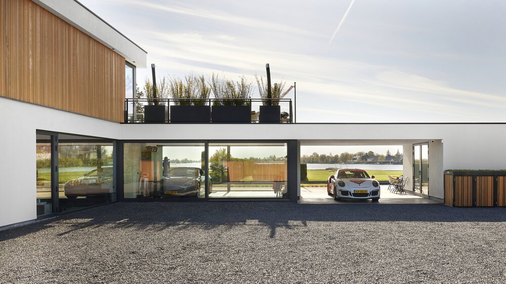 Architectural photos featuring parking spaces by the water.