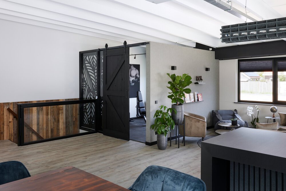 Interior photo of a commercial space with an area for exercise.