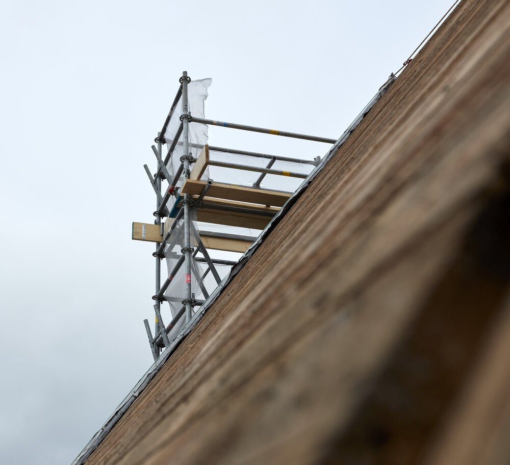 Scaffolding extended beyond the roof ridge in 2021.