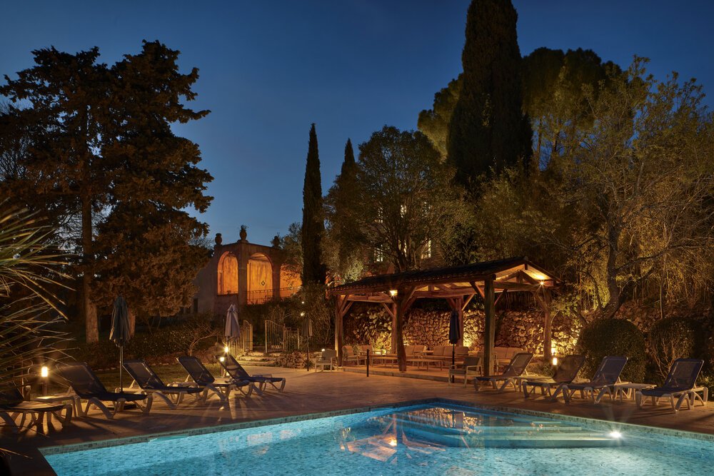 Evening exterior view from the swimming pool.