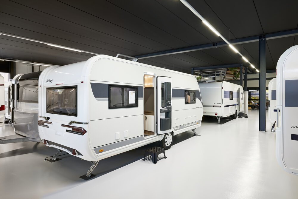 Interior photography of a caravan showroom.