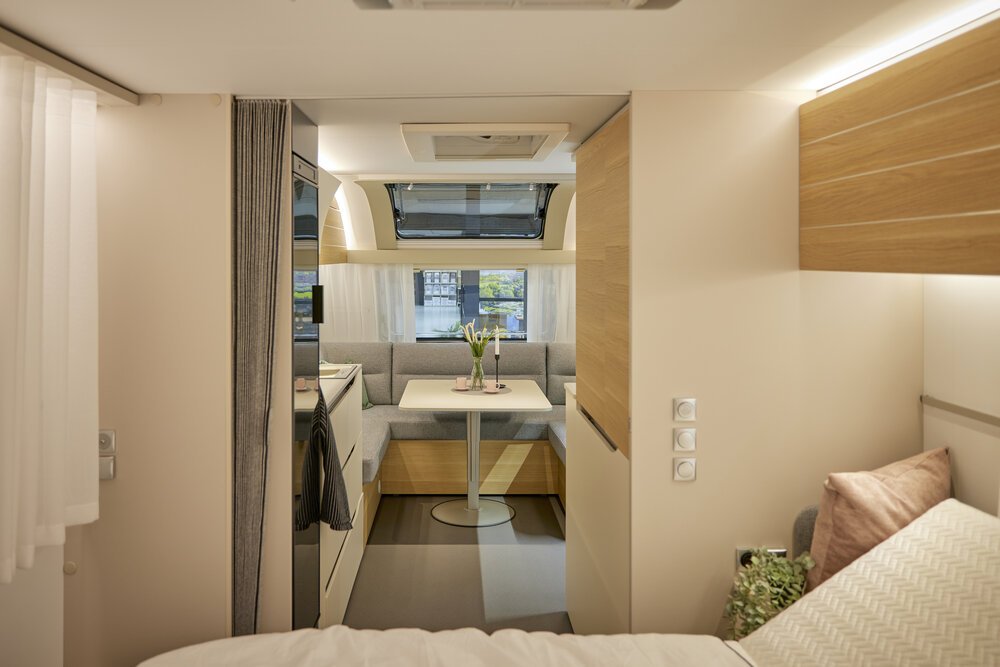 Interior photo of the seating area in the Adria Adora 613 UT.