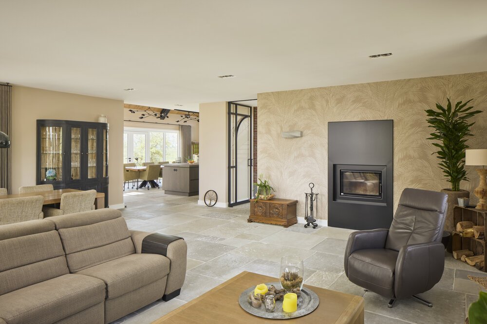 Interior photo showing the continuous acoustic spray ceiling.