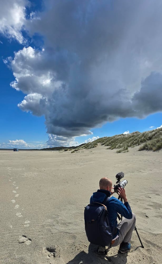 Skies. I love beautiful Dutch skies. But here, I pointed my camera at marram grass swaying in the sunlight — it eventually became a shot of just two or three seconds.  