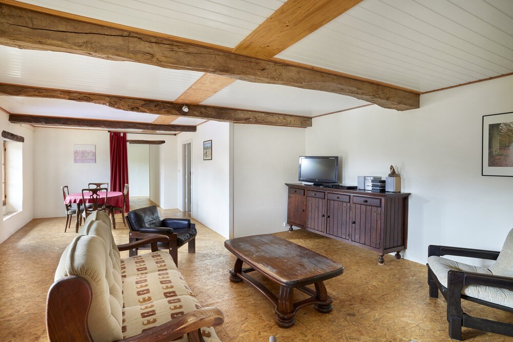 Interieurfoto woonverdieping van vakantiewoning #4.