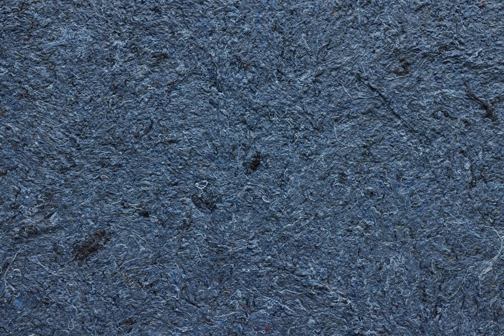 Detailfoto van katoenen wandbekleding.